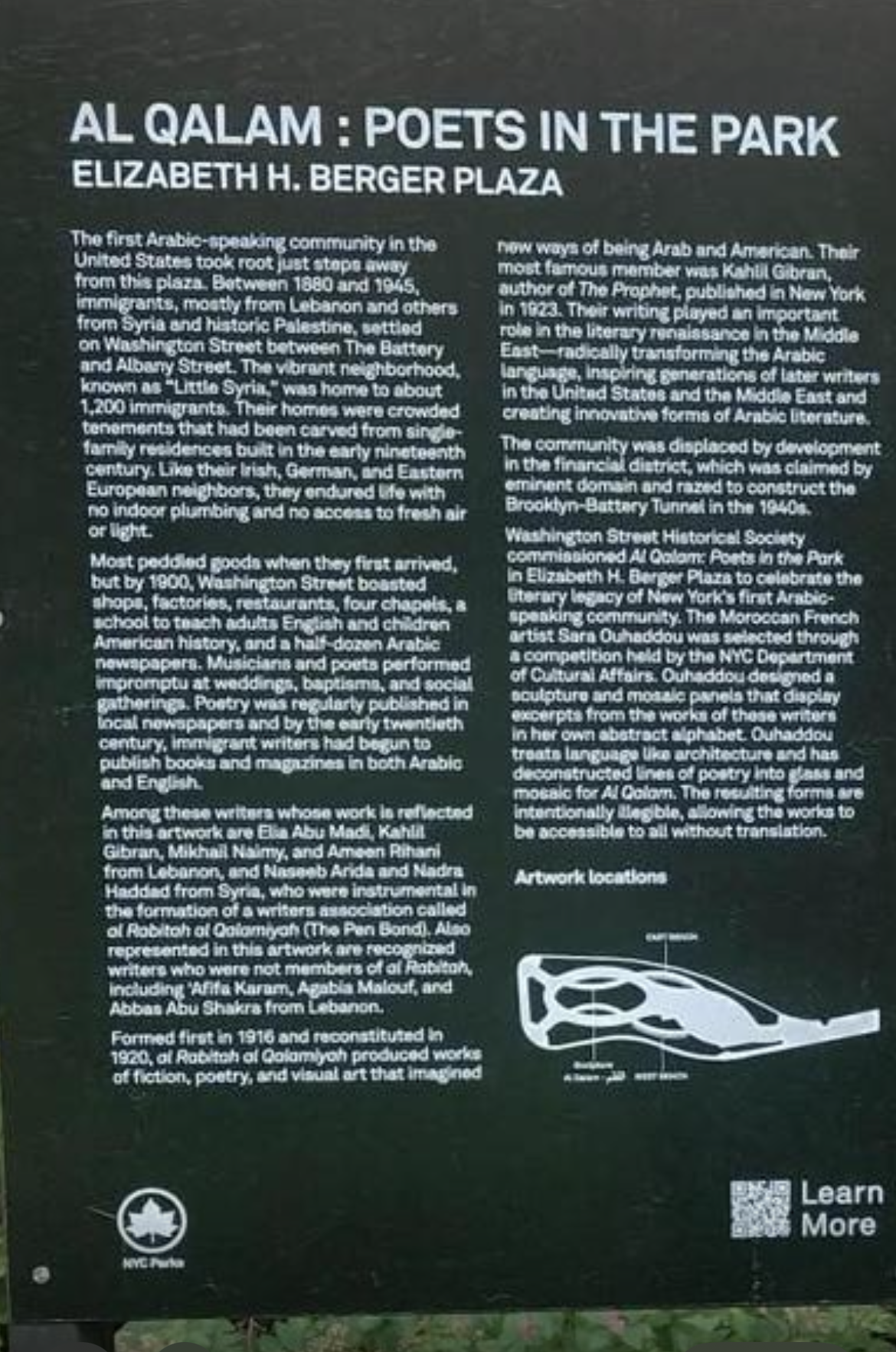 Revised Al Qalam sign describing immigrants as mostly from Lebanon and others from Syria and historic Palestine.